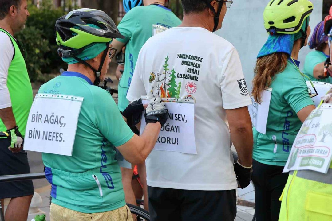 Bisikletçiler orman yangınlarına dikkat çekmek için pedalladı