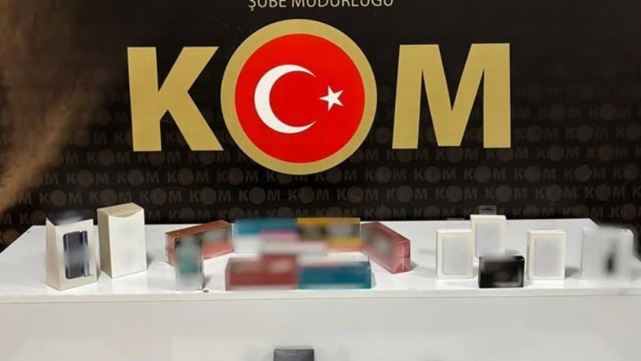 İş yerine yapılan baskında çok sayıda kaçak ürün ele geçirildi