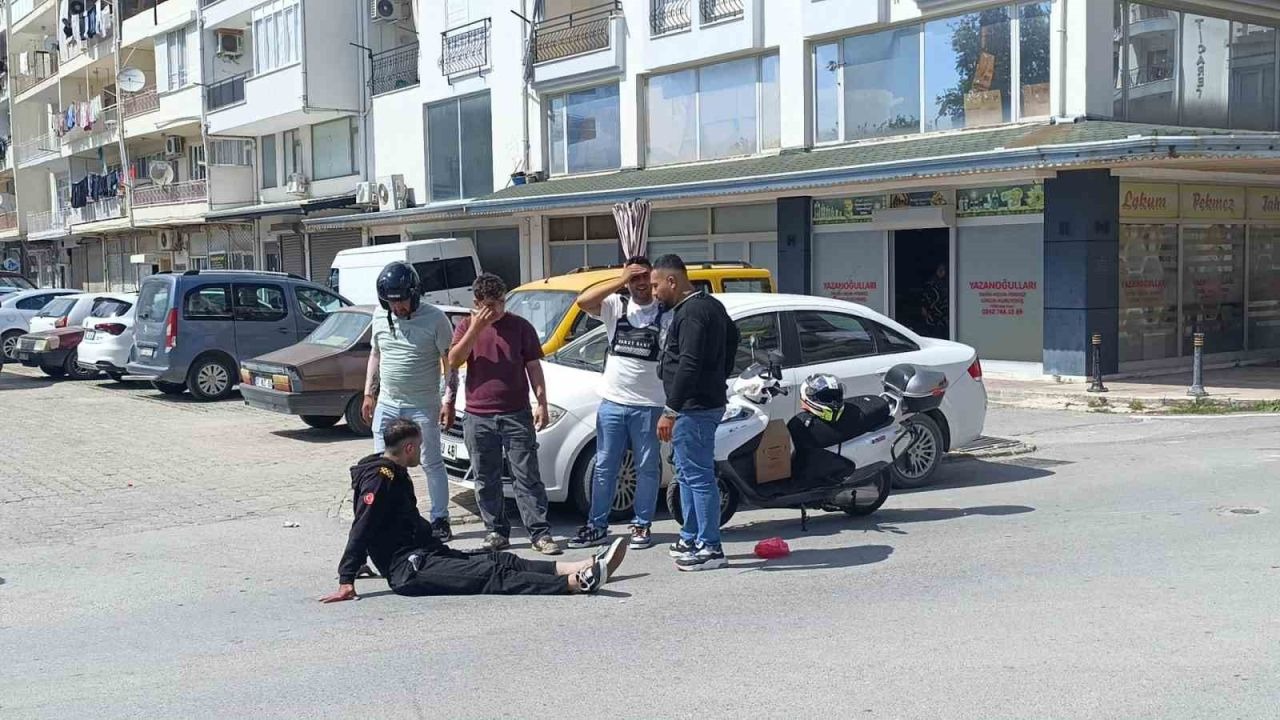 Bisikletli çocuğa çarpmamak için motosikletini devirip yaralandı